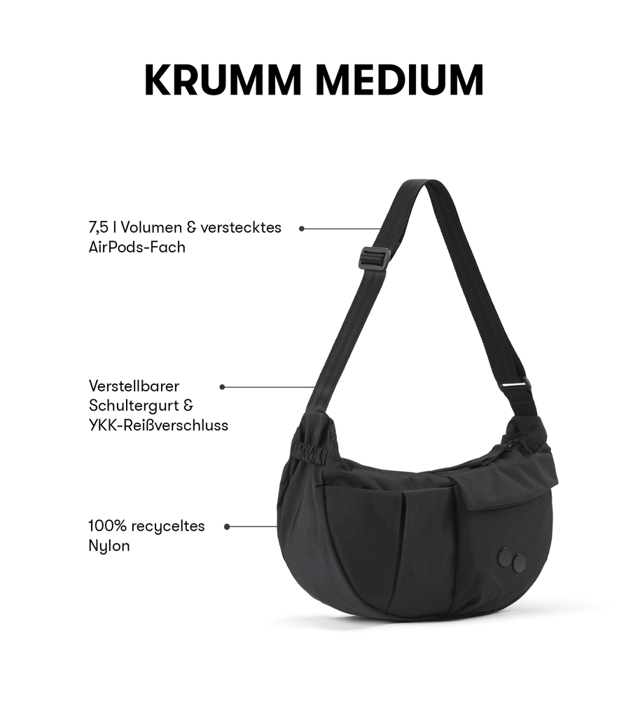 
                  
                    KRUMM – Mittelgroße Crinkle-Tasche in Schwarz
                  
                