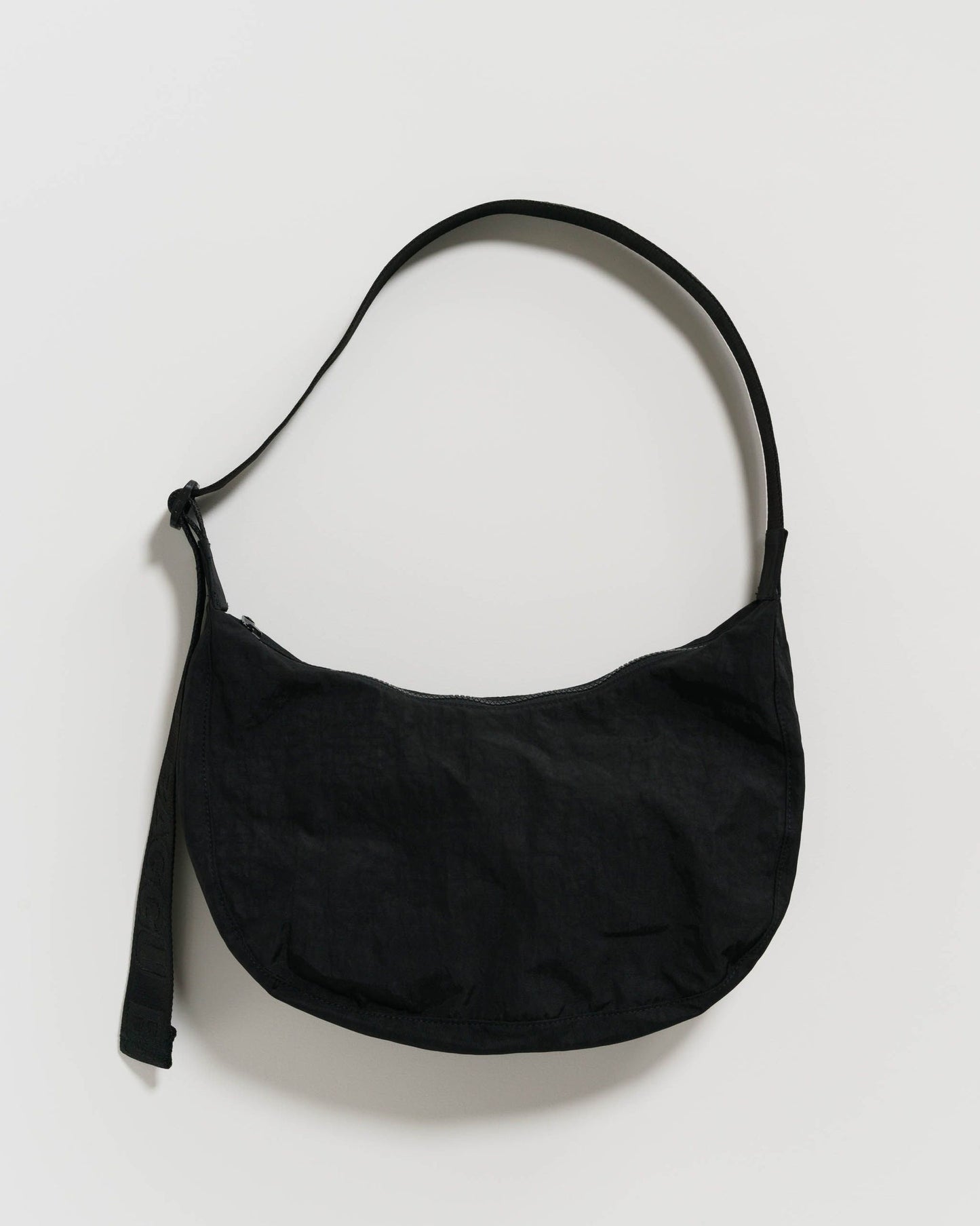 
                  
                    Black Medium Nylon Crescent Bag
                  
                
