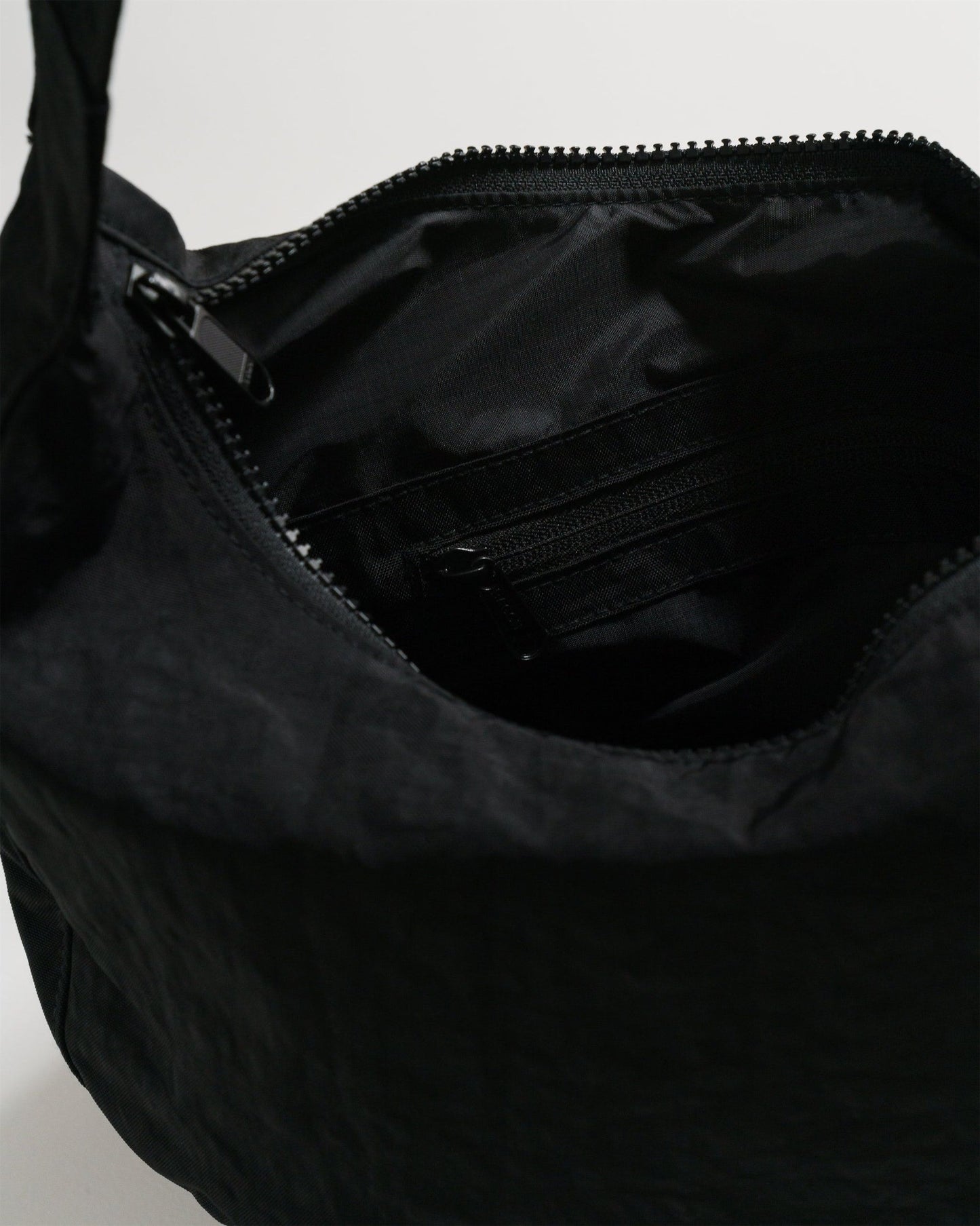 
                  
                    Black Medium Nylon Crescent Bag
                  
                