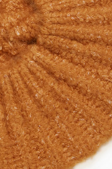
                  
                    IAVAIRAJ Cathay Spice Hat
                  
                