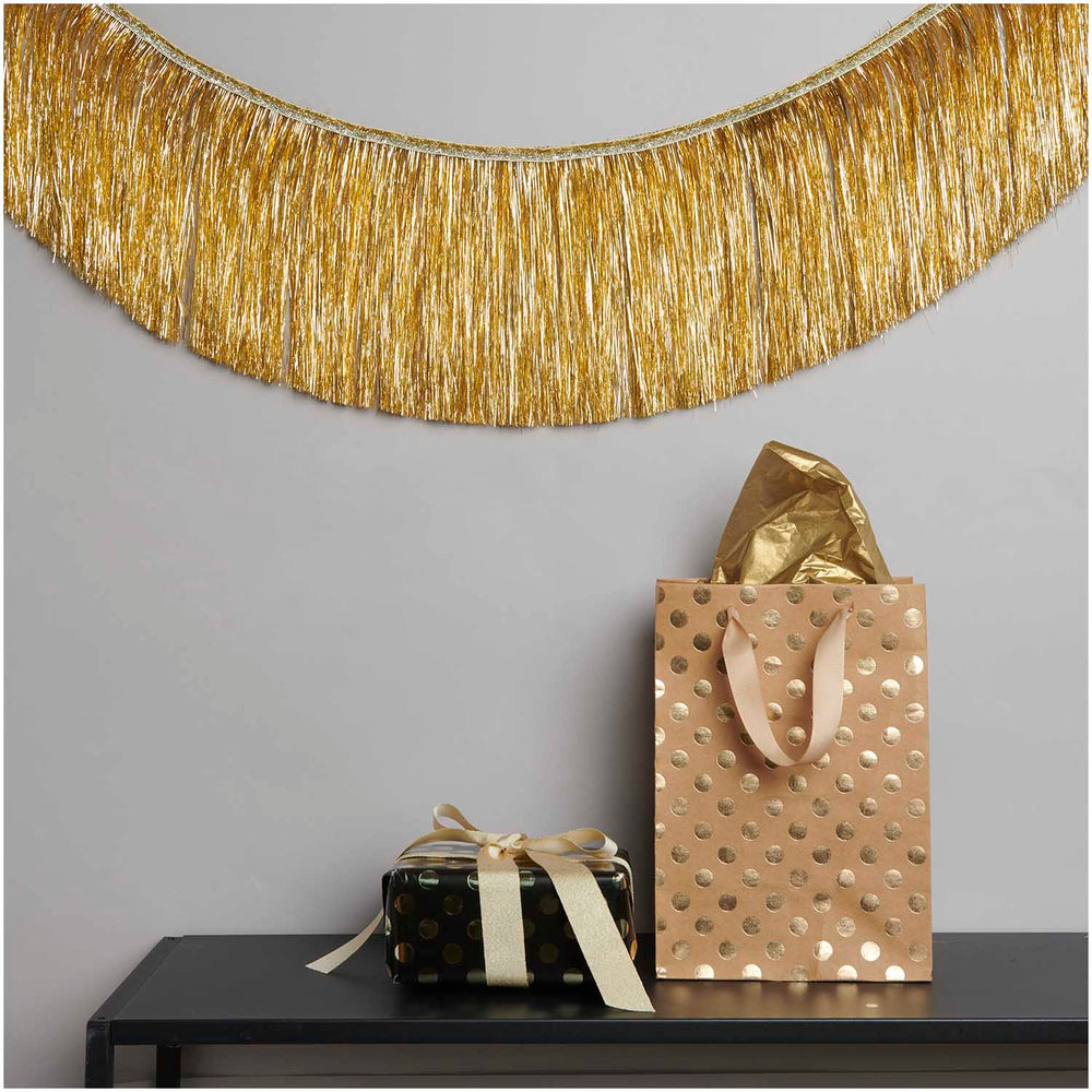 
                  
                    Gold Tinsel Garland
                  
                