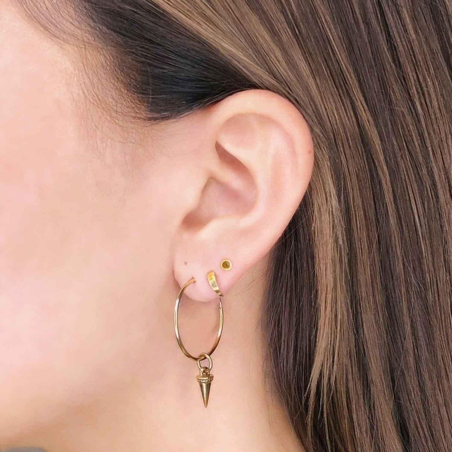 
                  
                    Gold Mini Stud Earrings
                  
                