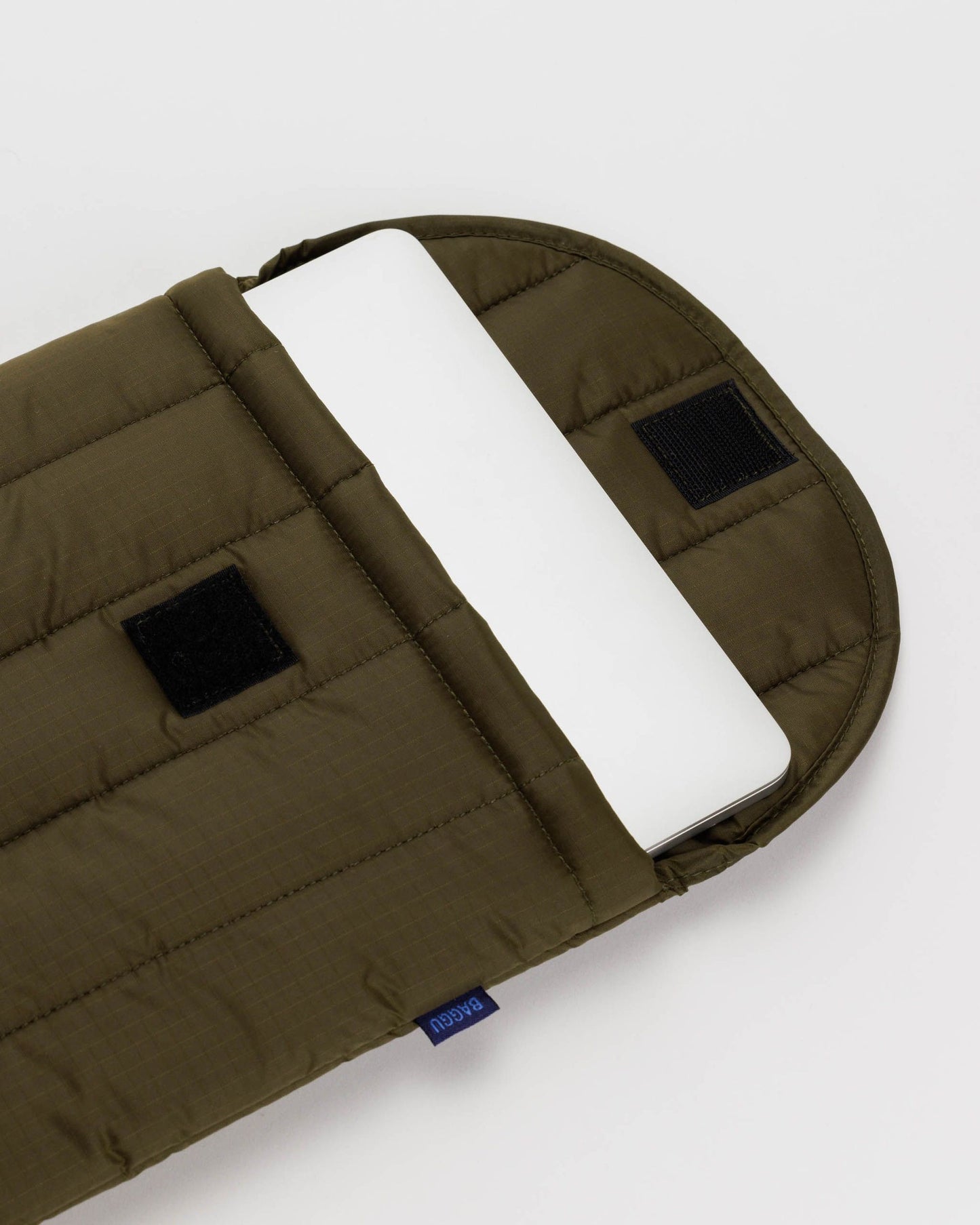 
                  
                    Tamarind Puffy Laptop Sleeve
                  
                