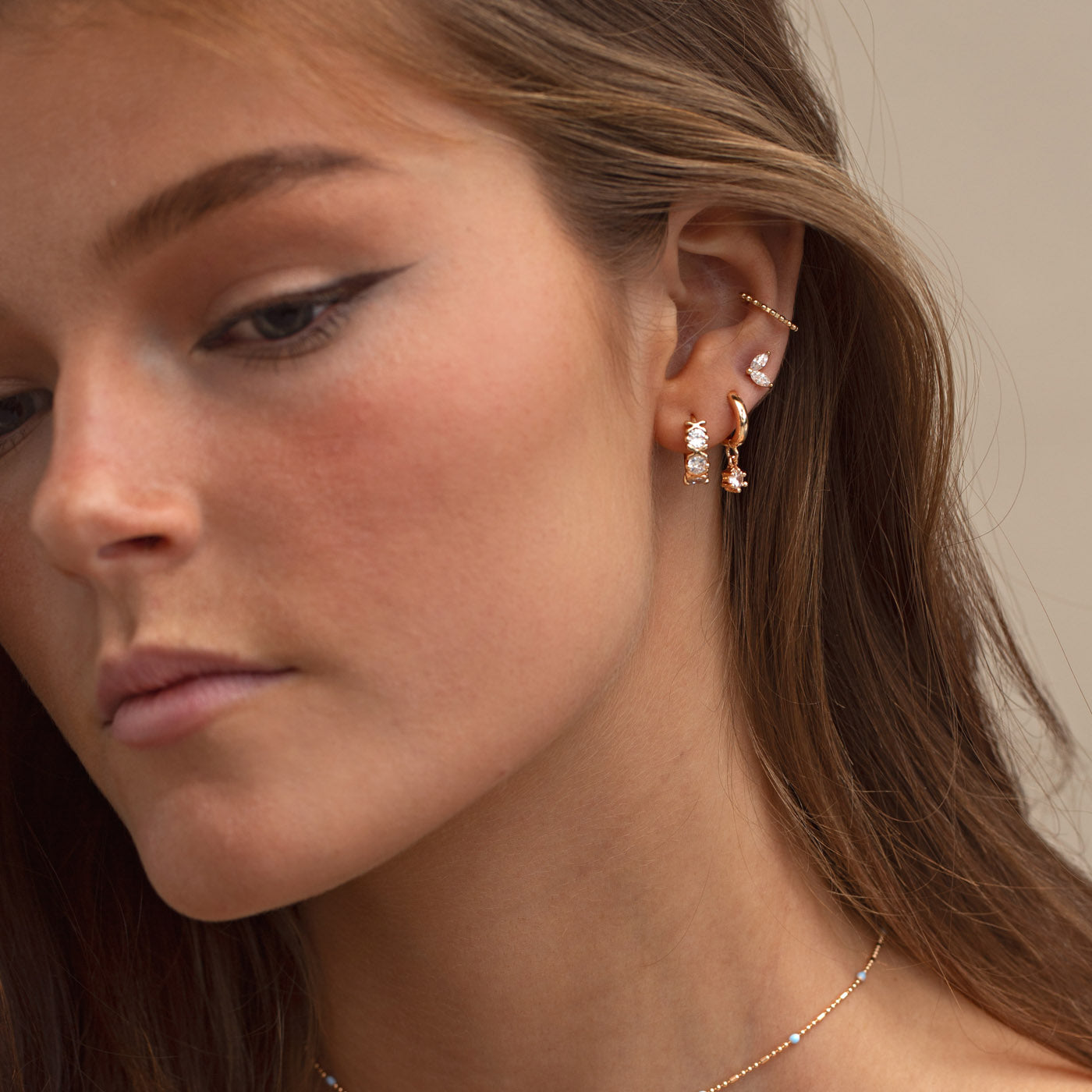 
                  
                    LEAH White Crystal Leaf Stud Earrings
                  
                