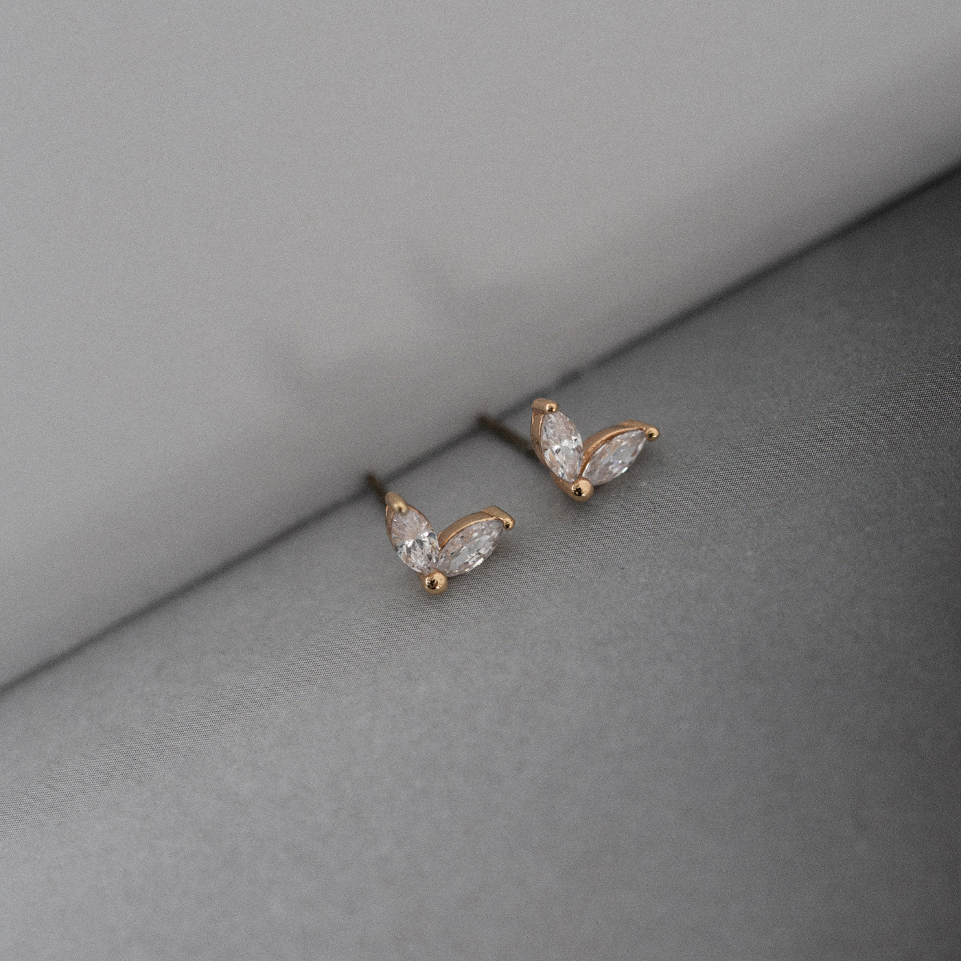 
                  
                    LEAH White Crystal Leaf Stud Earrings
                  
                