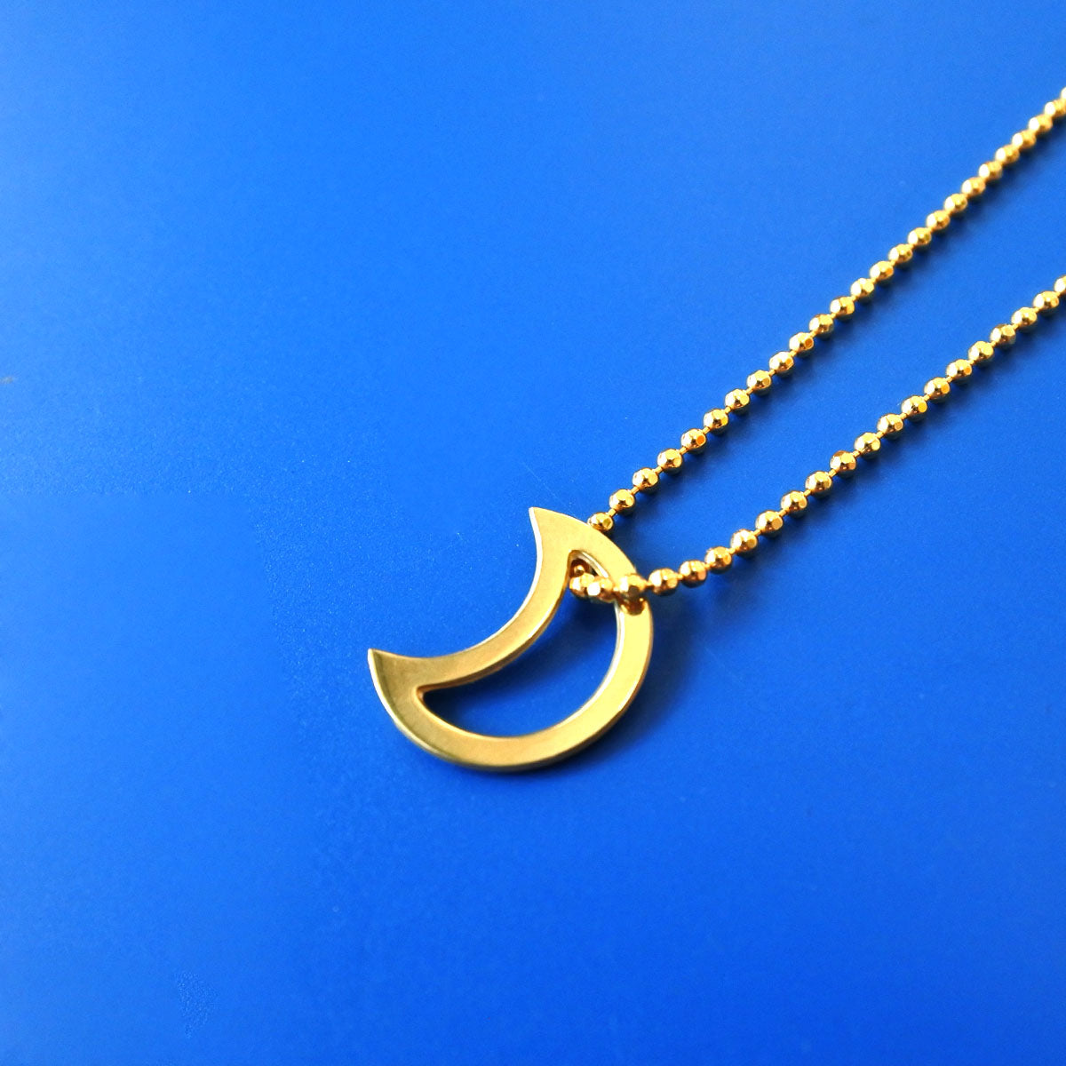 
                  
                    Golden Moon Open Necklace
                  
                