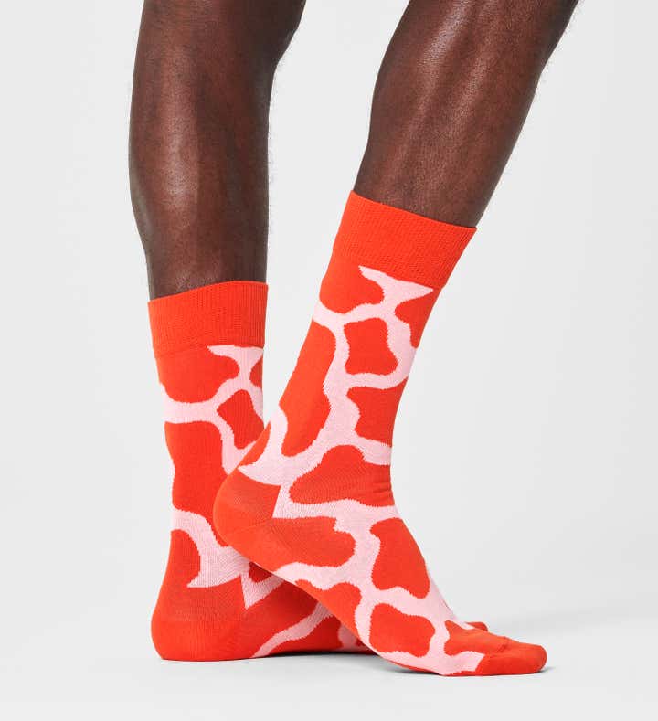 
                  
                    Orangefarbene Kuhsocken 
                  
                