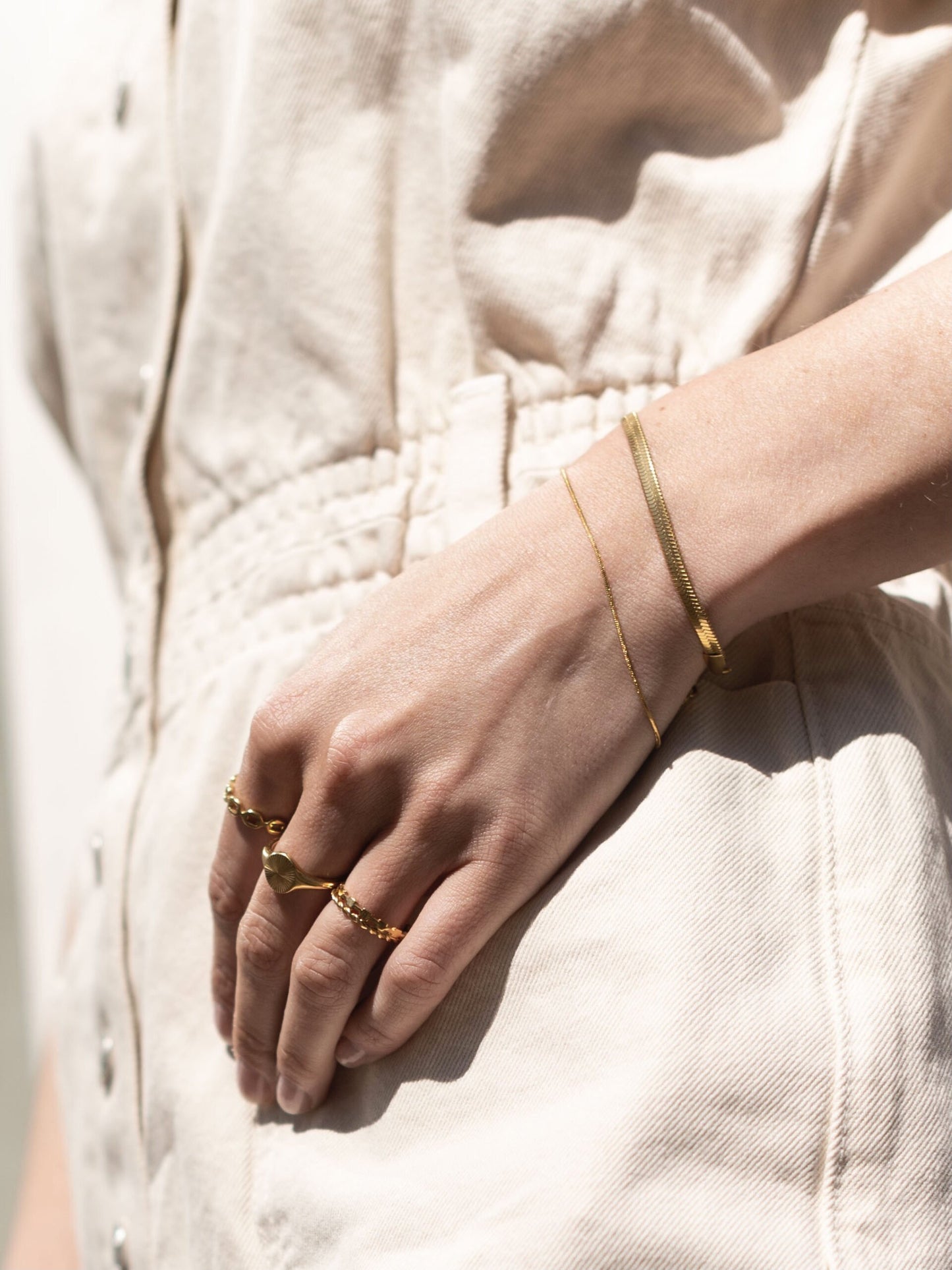 
                  
                    Gold Flat Snake Bracelet
                  
                