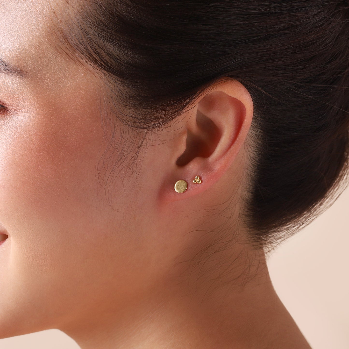 
                  
                    Gold Plated Triple Stud Earrings
                  
                