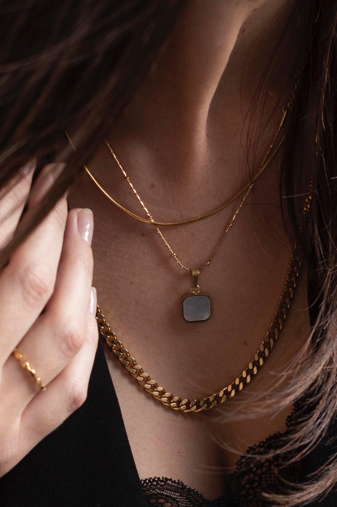 
                  
                    Small Gold Snake 4 Lengths Possible Necklace
                  
                