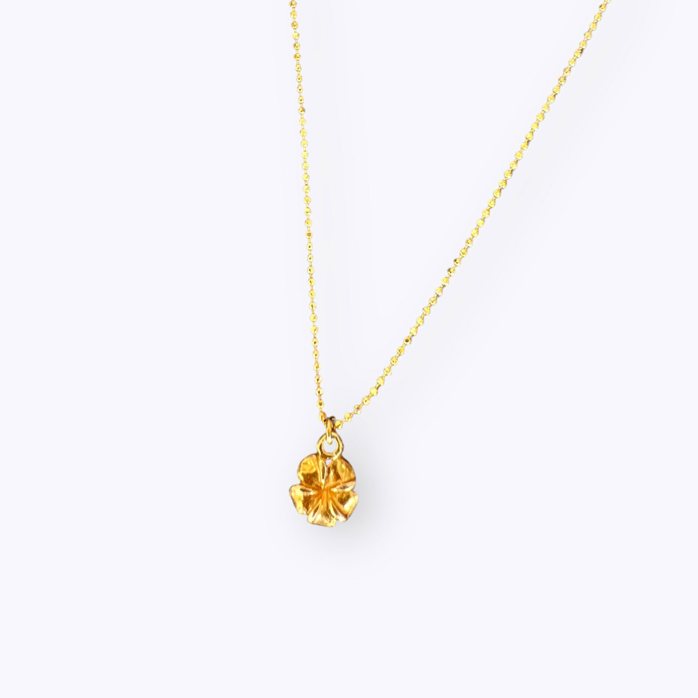 
                  
                    Golden Frangipani Flower Necklace
                  
                