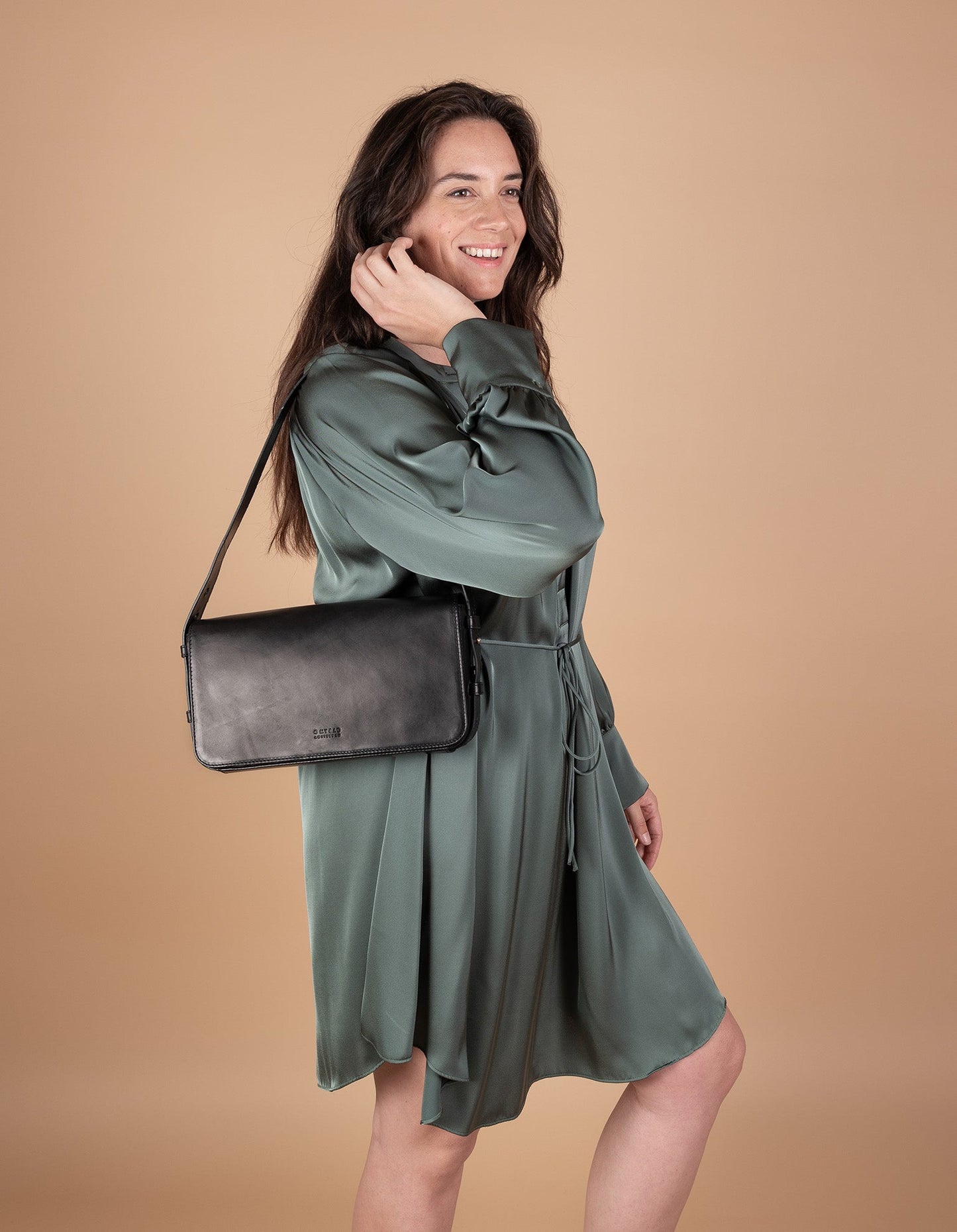 
                  
                    GINA Schwarze klassische Baguette-Tasche aus Leder
                  
                