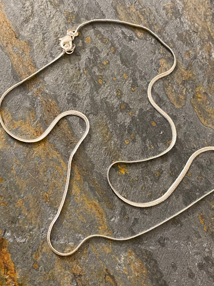 
                  
                    Silver Snake Necklace
                  
                