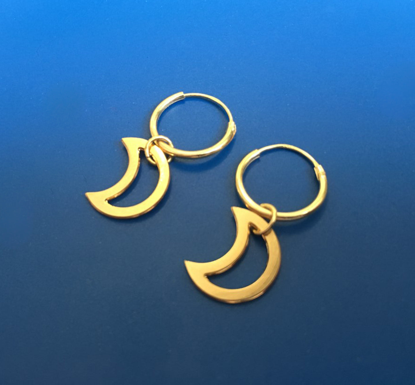 
                  
                    Golden Moon Hoop Earrings
                  
                