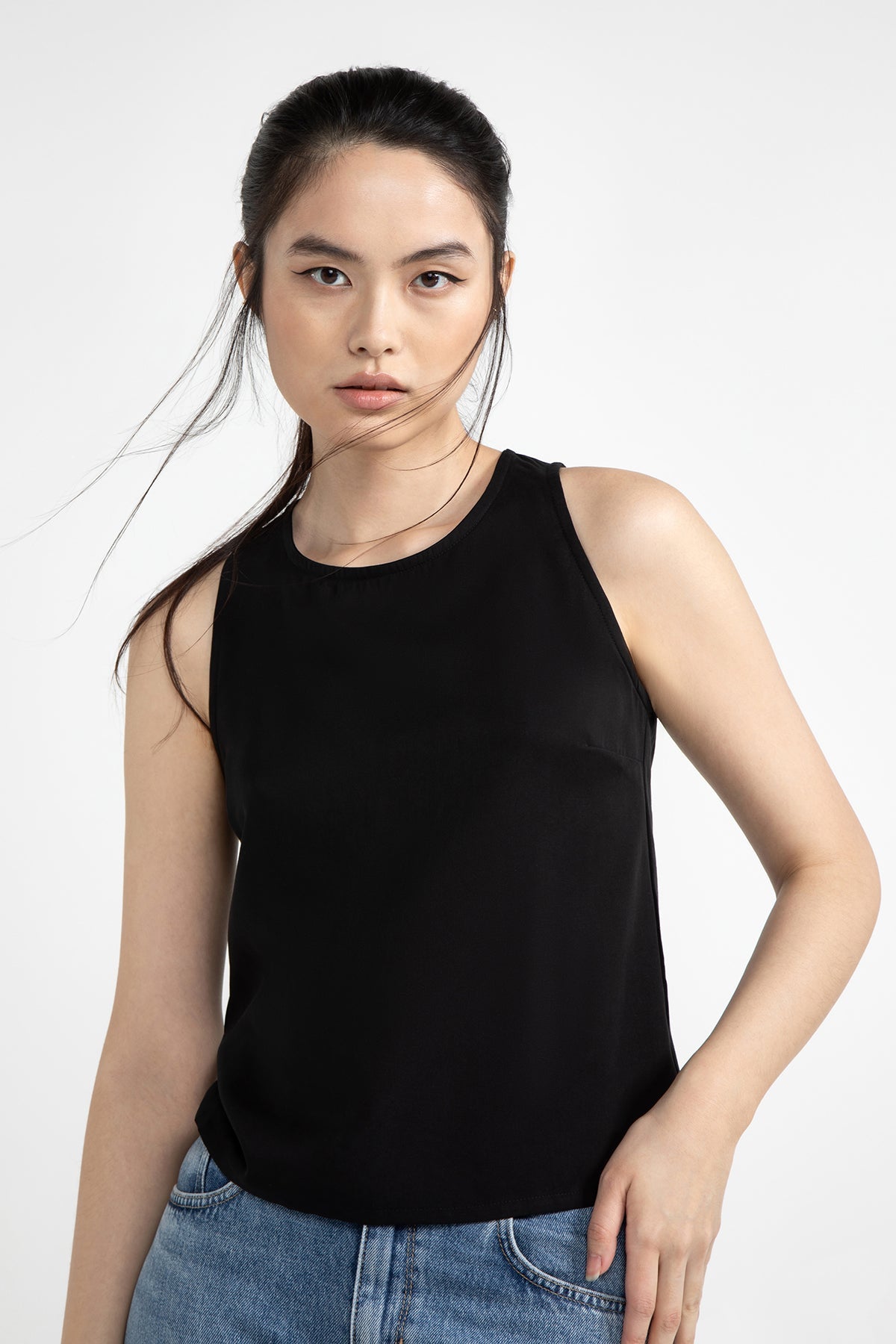 
                  
                    CHEMILLA Black Tank Top
                  
                