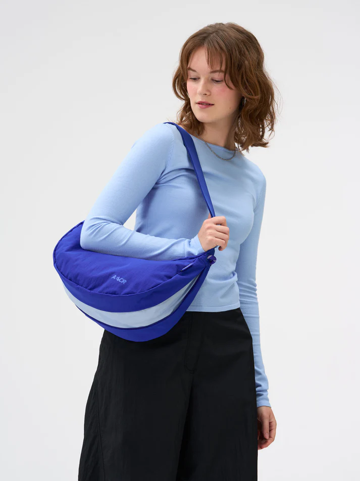 
                  
                    Electric Blue Sling Bag
                  
                