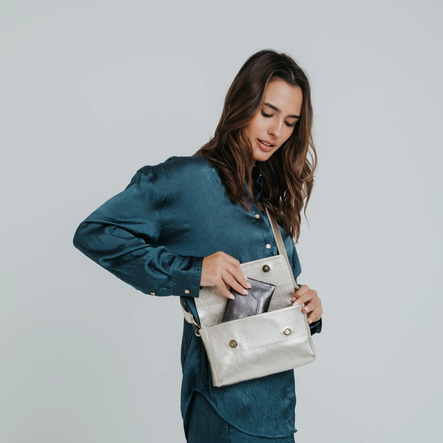 
                  
                    Champagne Metallic Large Pack Shape Bag
                  
                