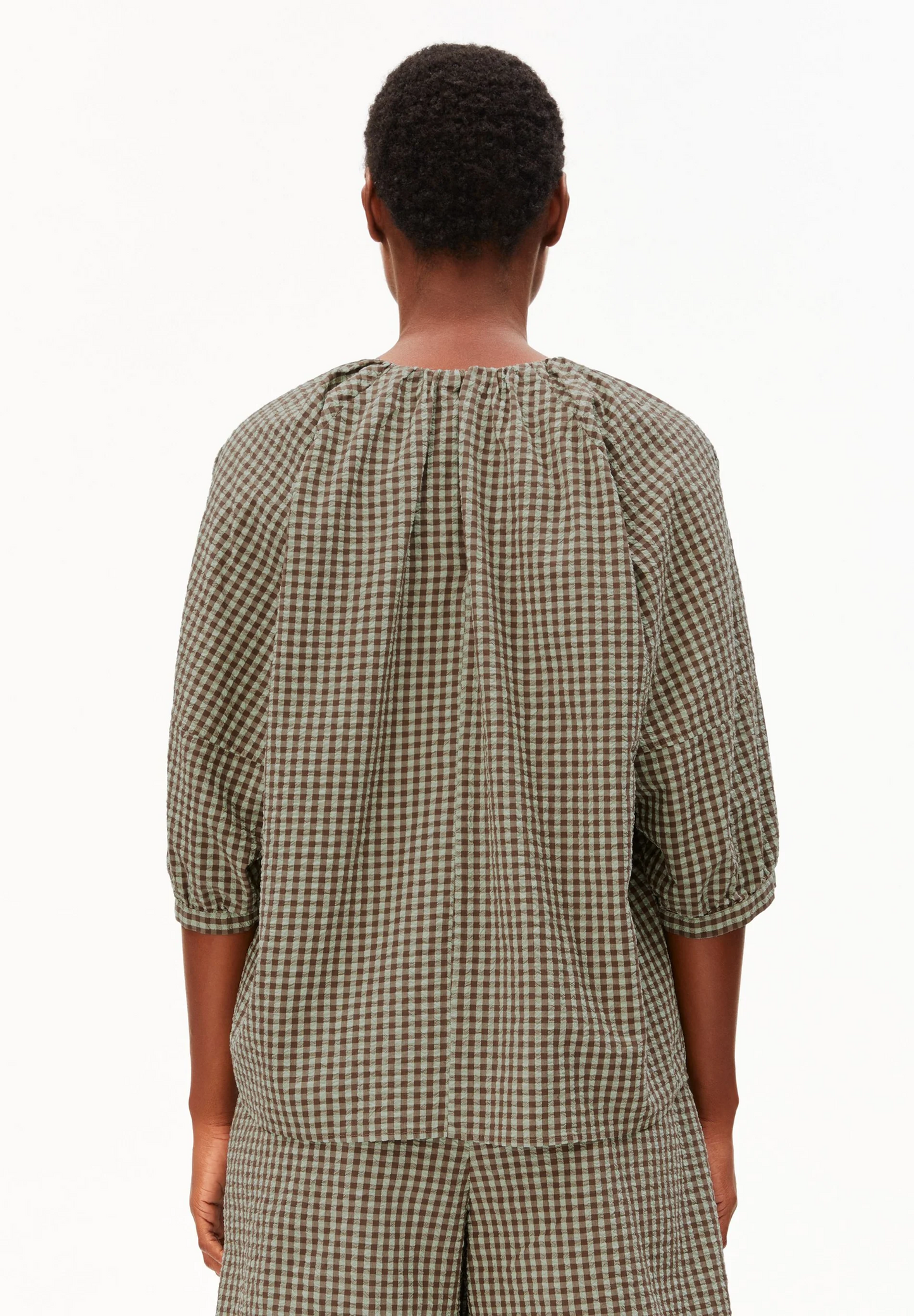 
                  
                    BLUSE AUS GESCHMACKGETROCKNETEM PALM VICHY SEERSUCKER
                  
                