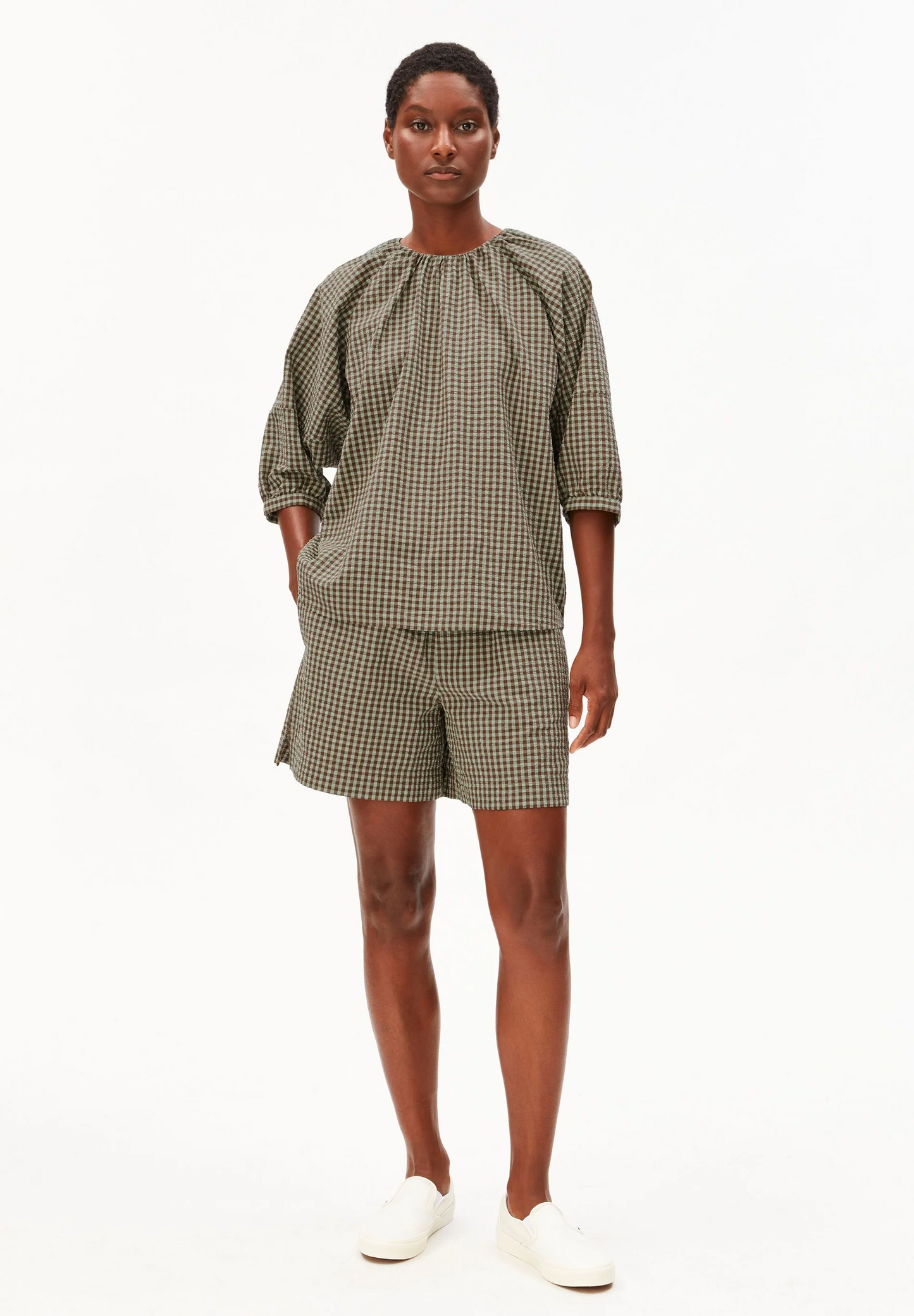 
                  
                    BLUSE AUS GESCHMACKGETROCKNETEM PALM VICHY SEERSUCKER
                  
                