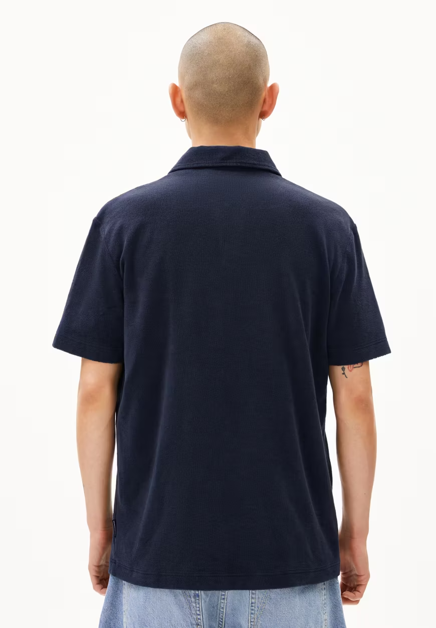 
                  
                    MAARKOS Nachthimmel-Polo-Frottee-T-Shirt
                  
                