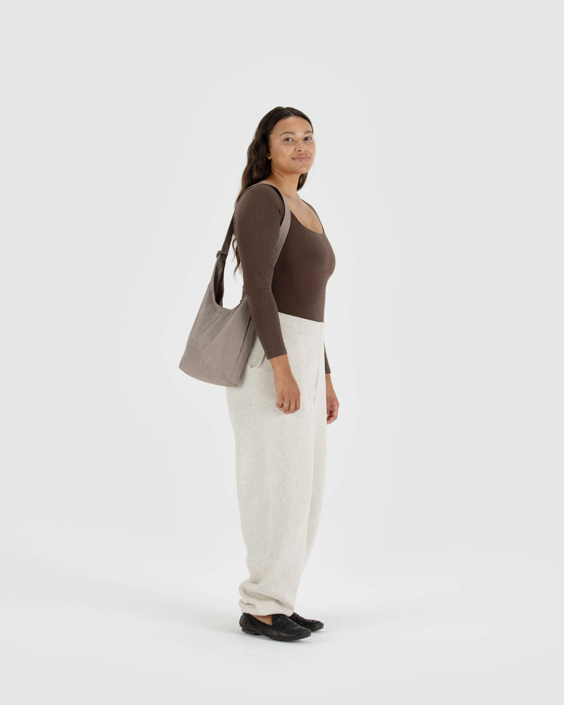 
                  
                    Kleine Schultertasche aus Nylon „Dove“
                  
                