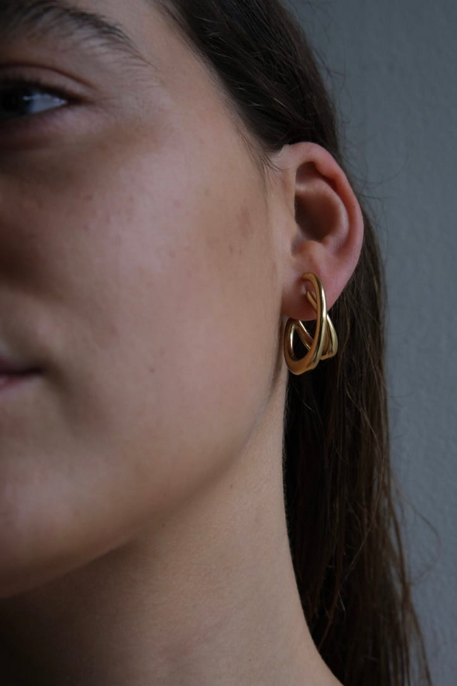 
                  
                    Gold Cutted Earring
                  
                