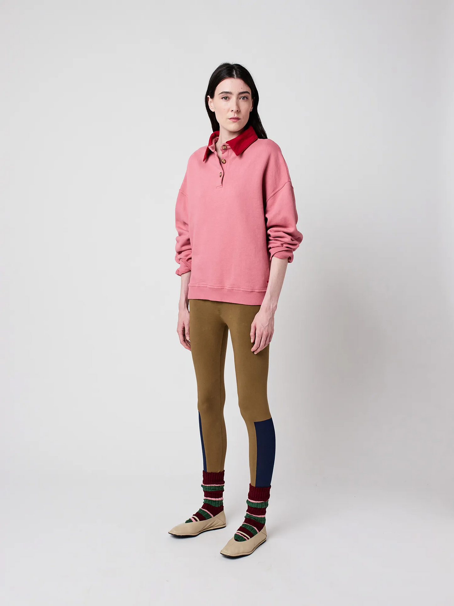 
                  
                    Rosa Polo-Oversize-Pullover mit Colorblock-Muster
                  
                