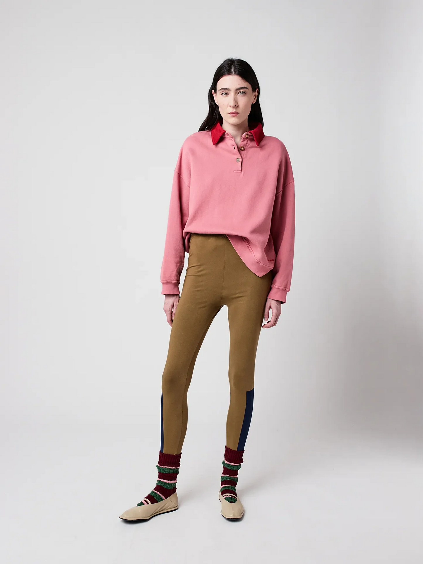 
                  
                    Rosa Polo-Oversize-Pullover mit Colorblock-Muster
                  
                