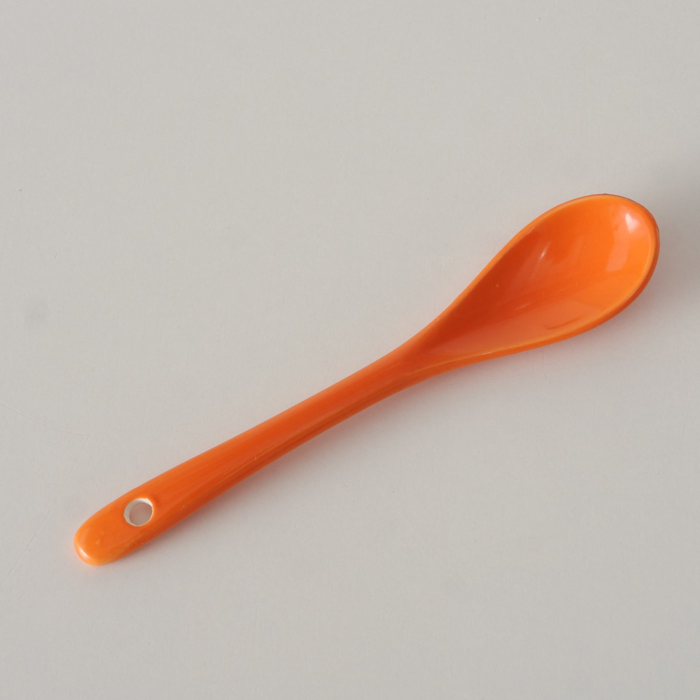 
                  
                    Orangefarbener Marmeladentopf aus Keramik
                  
                