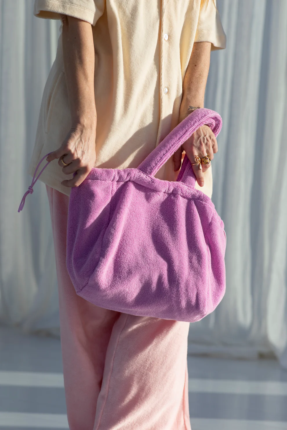 
                  
                    Kleine weiche Naram-Handtasche in Fuchsia
                  
                