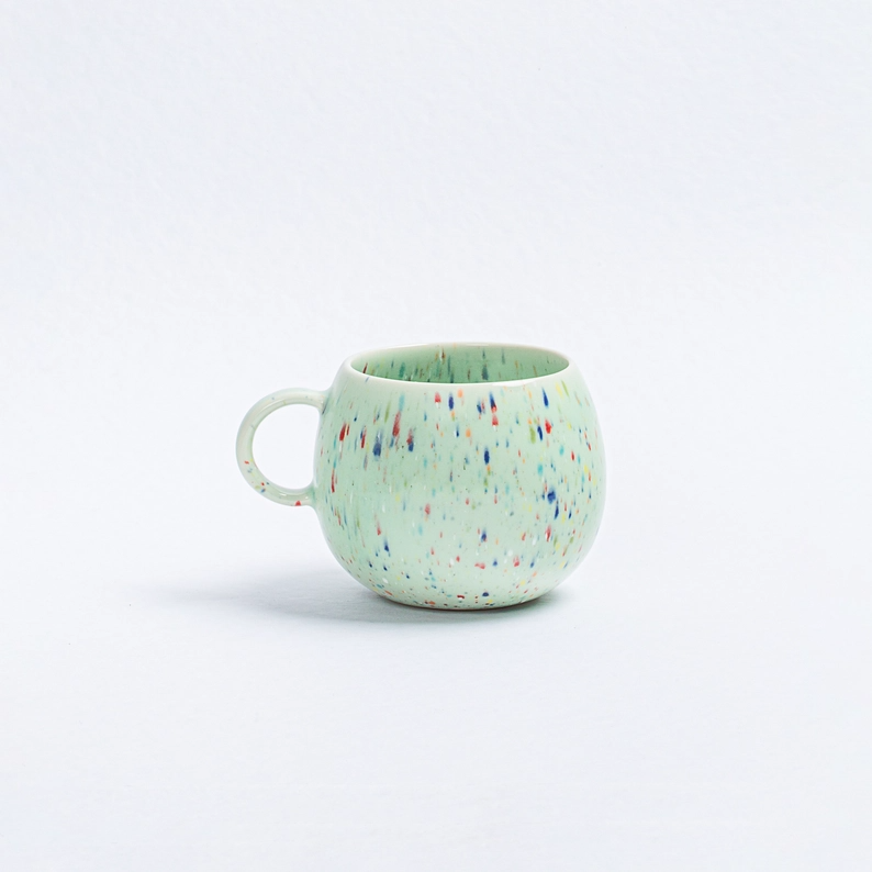 
                  
                    Grüne Kugel Tasse
                  
                