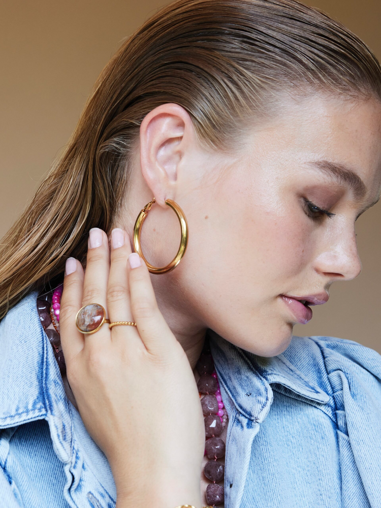 
                  
                    Gold Ball Ring
                  
                
