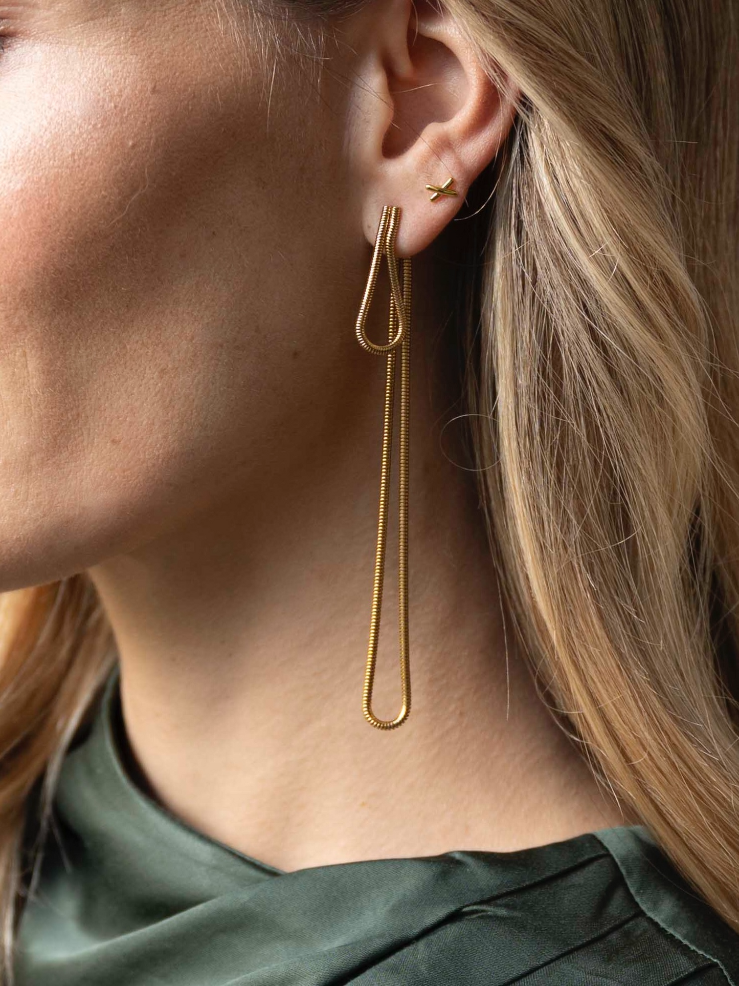
                  
                    Gold Studs "X" Earrings
                  
                