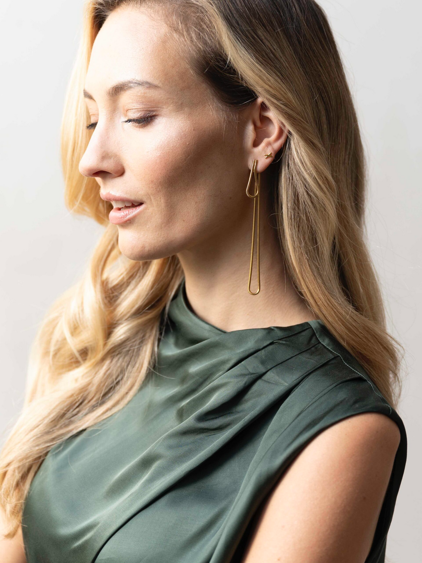 
                  
                    Gold Studs "X" Earrings
                  
                