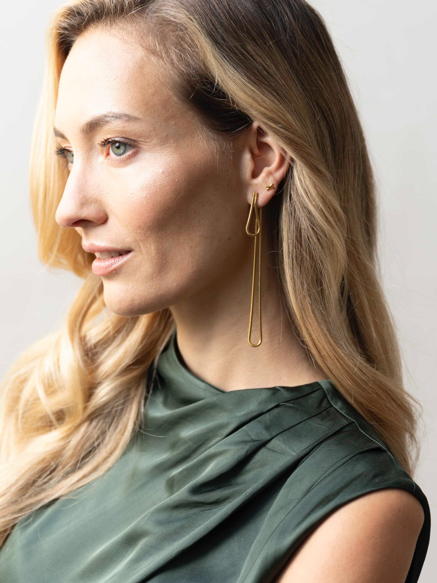 
                  
                    Gold Studs "X" Earrings
                  
                