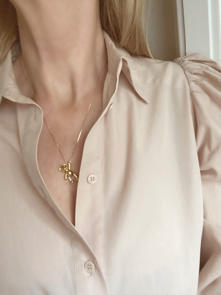 
                  
                    Gold Teddy Bear Pendant Necklace
                  
                
