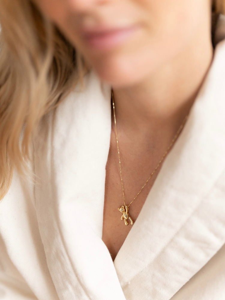 
                  
                    Gold Teddy Bear Pendant Necklace
                  
                