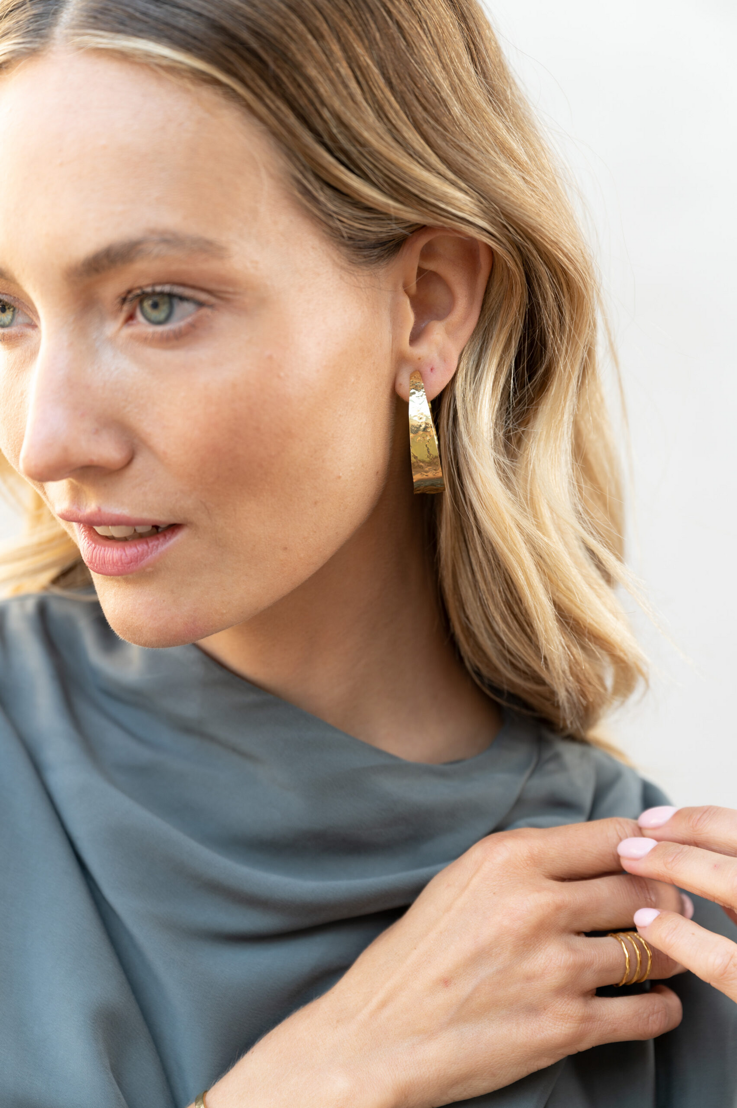 
                  
                    Gold Wide Hammered Hoops Earrings
                  
                