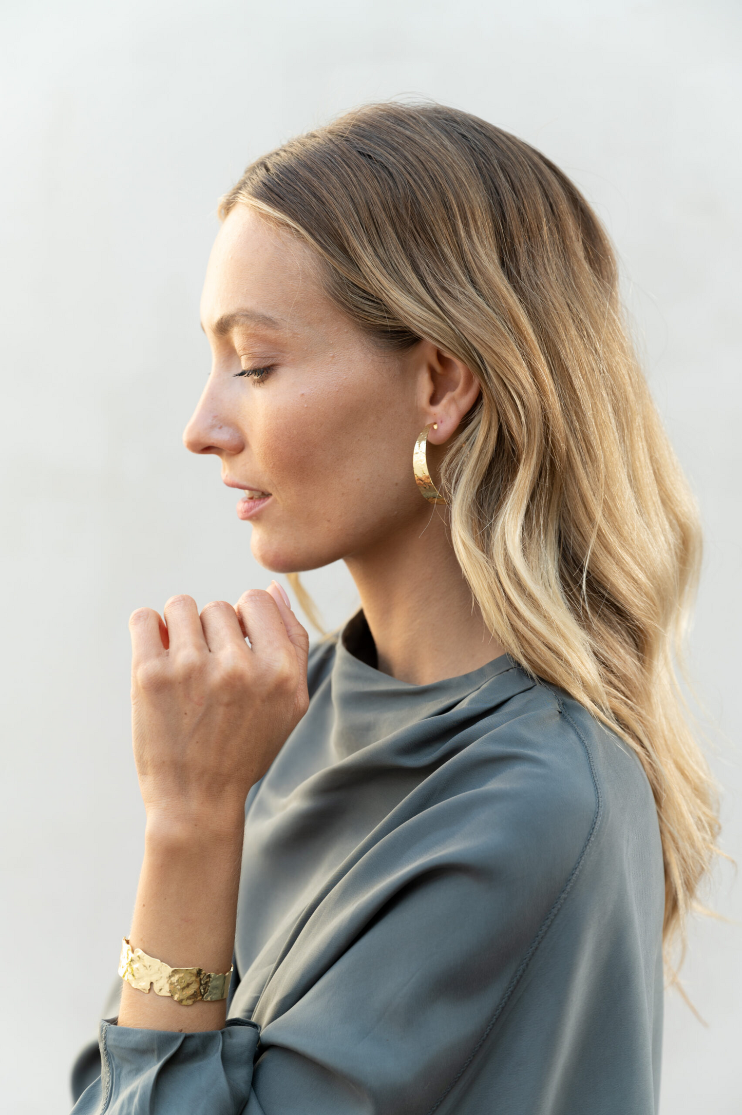 
                  
                    Gold Wide Hammered Hoops Earrings
                  
                