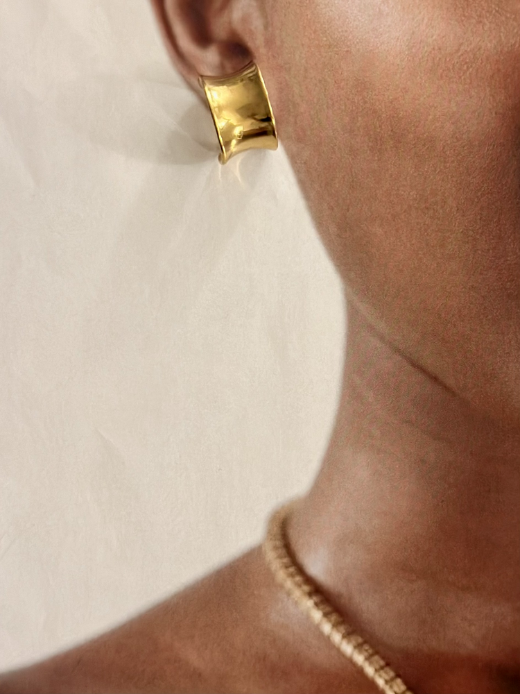 
                  
                    Gold Wide Short Earrings
                  
                