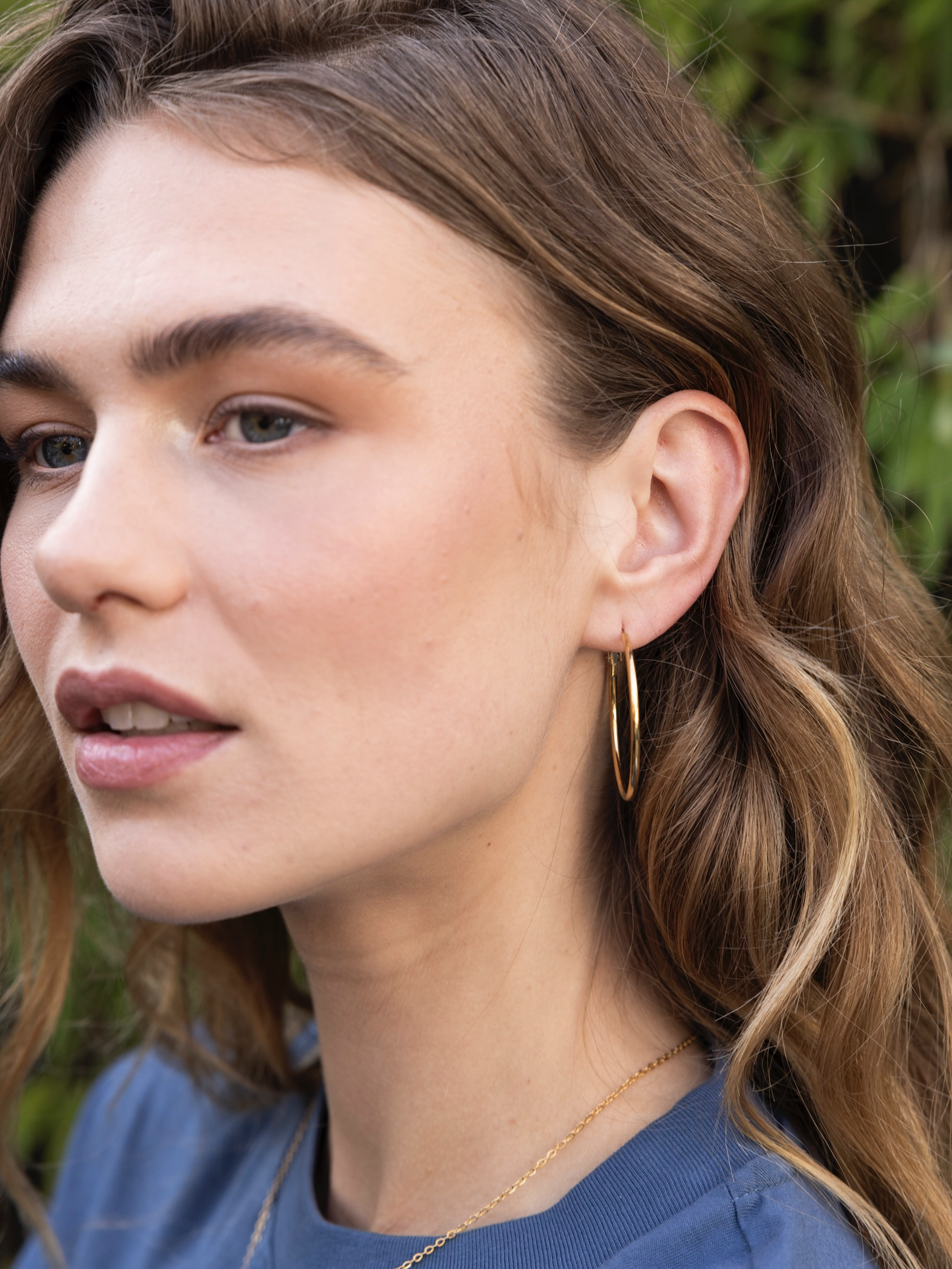 
                  
                    Medium Gold Hoops Earrings
                  
                