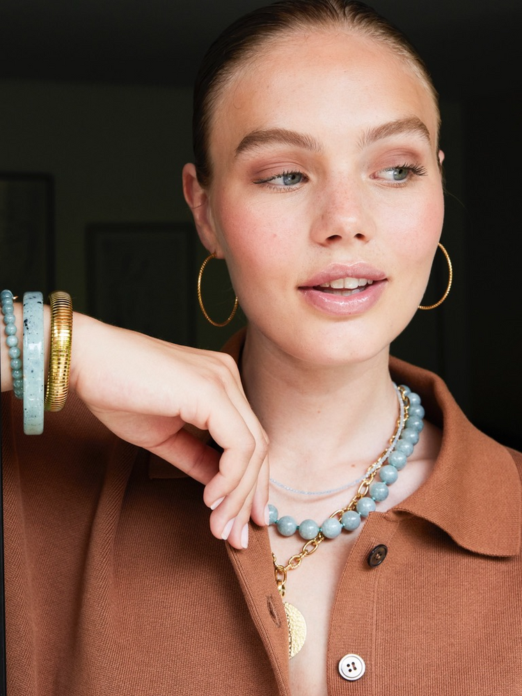 
                  
                    Small Gold Round Bangle Bracelet
                  
                