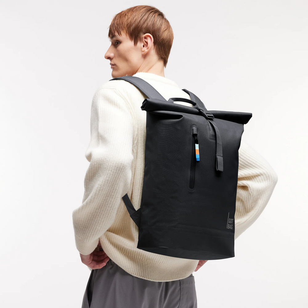 
                  
                    Black Rolltop Lite Backpack
                  
                