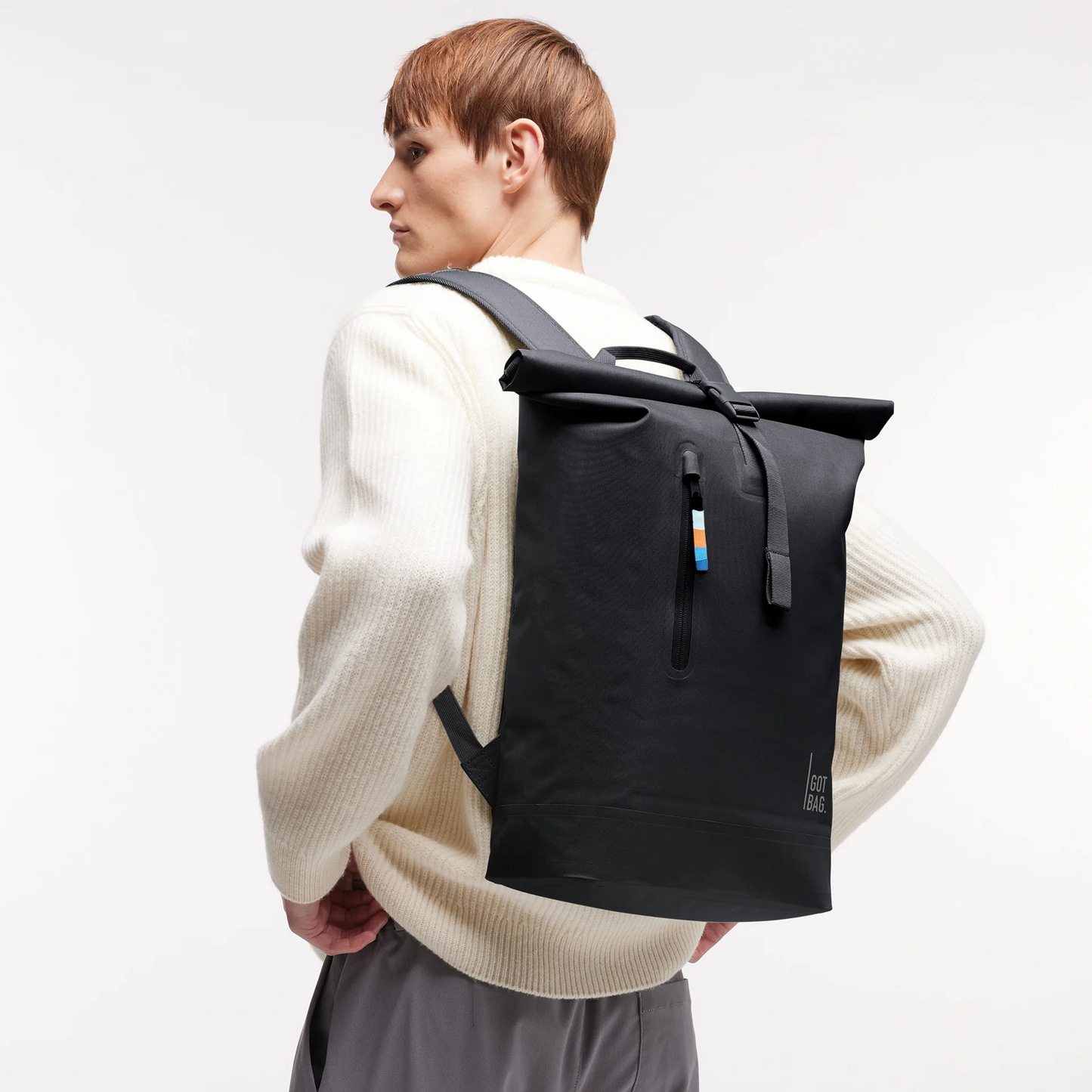 
                  
                    Black Rolltop Lite Backpack
                  
                
