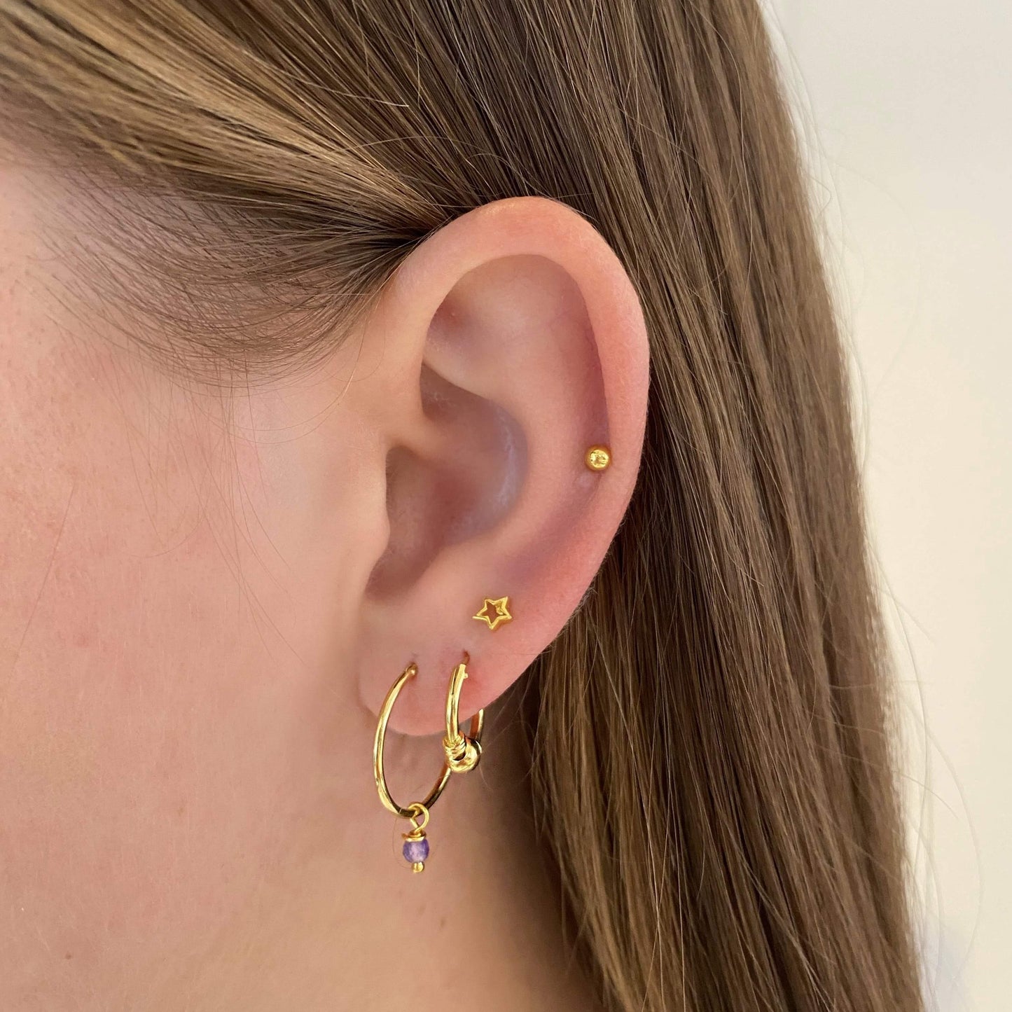 
                  
                    Gold Plated Hoop With Purple Stone Earrings
                  
                