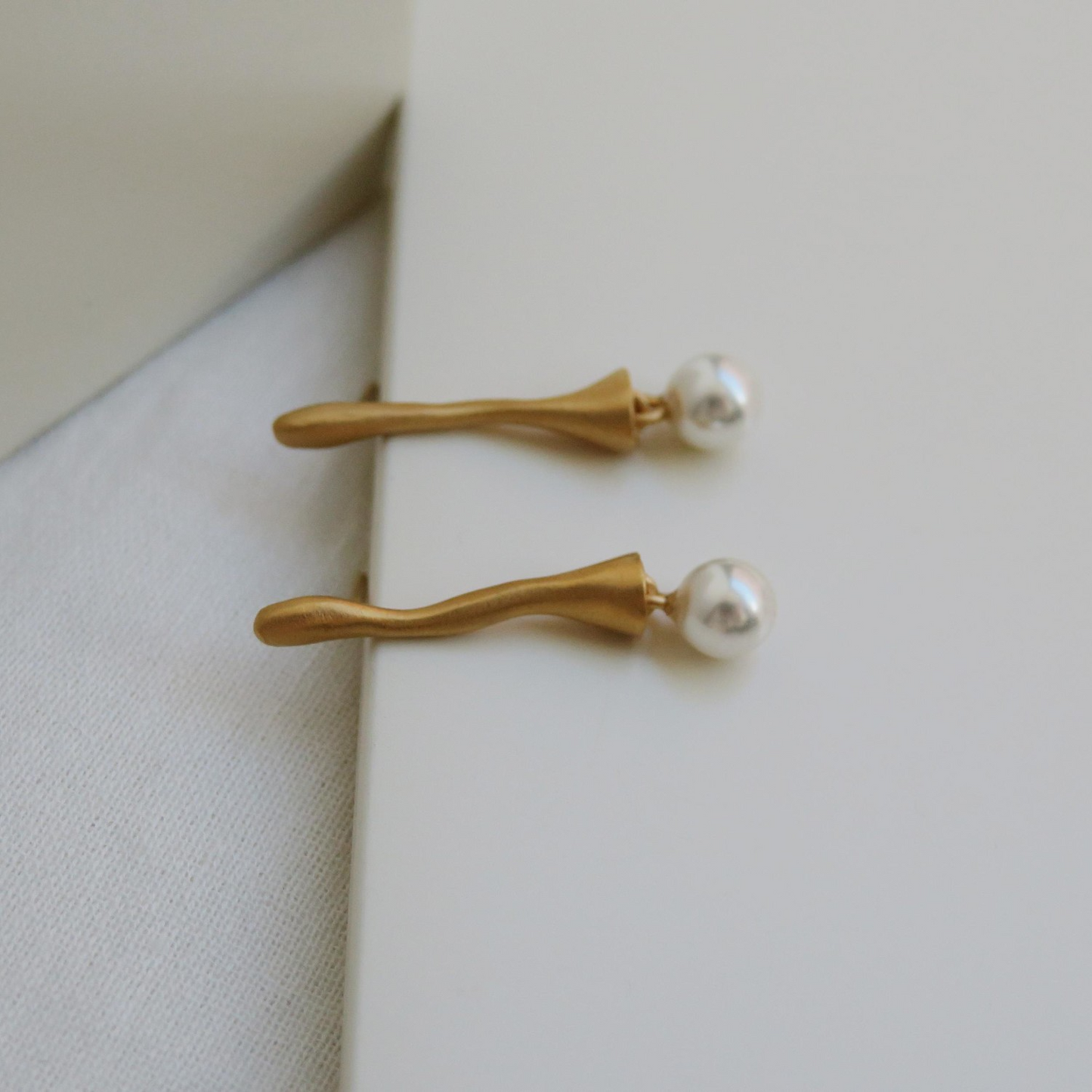 
                  
                    ECLAT Brass Earring
                  
                