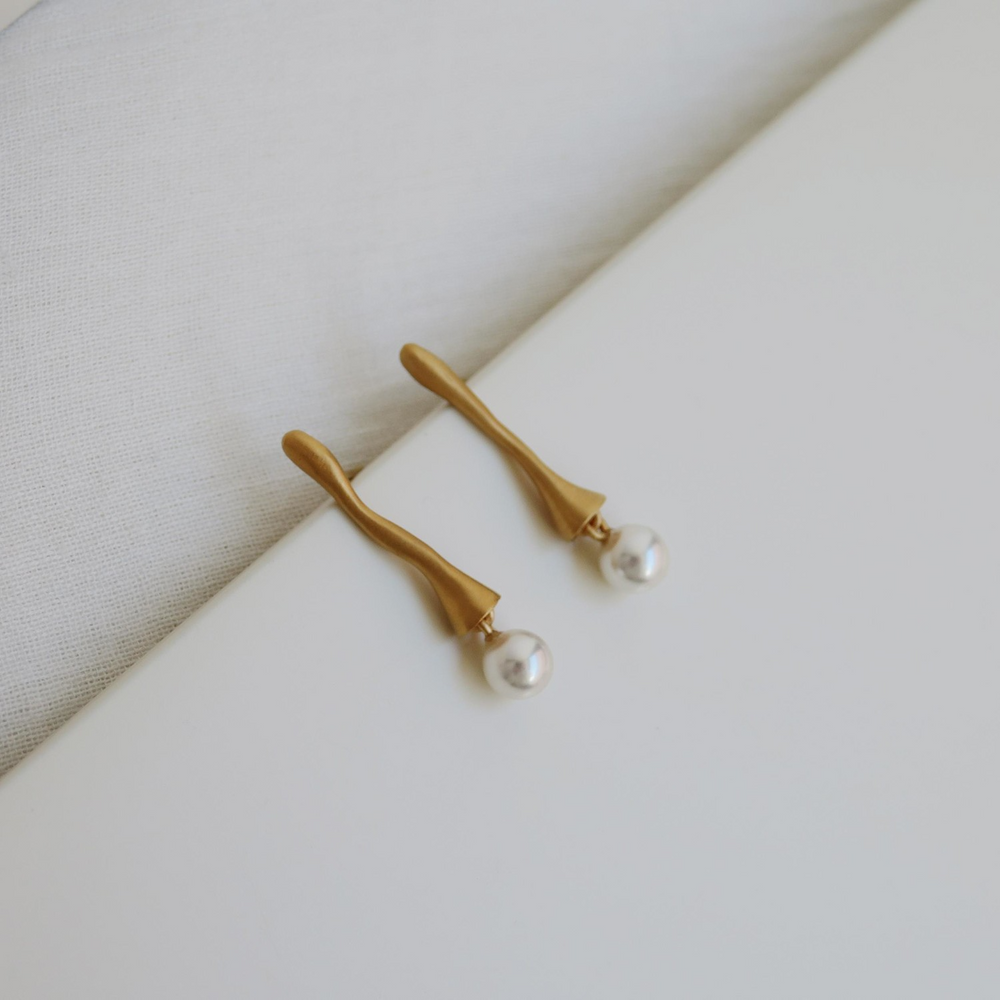 
                  
                    ECLAT Brass Earring
                  
                