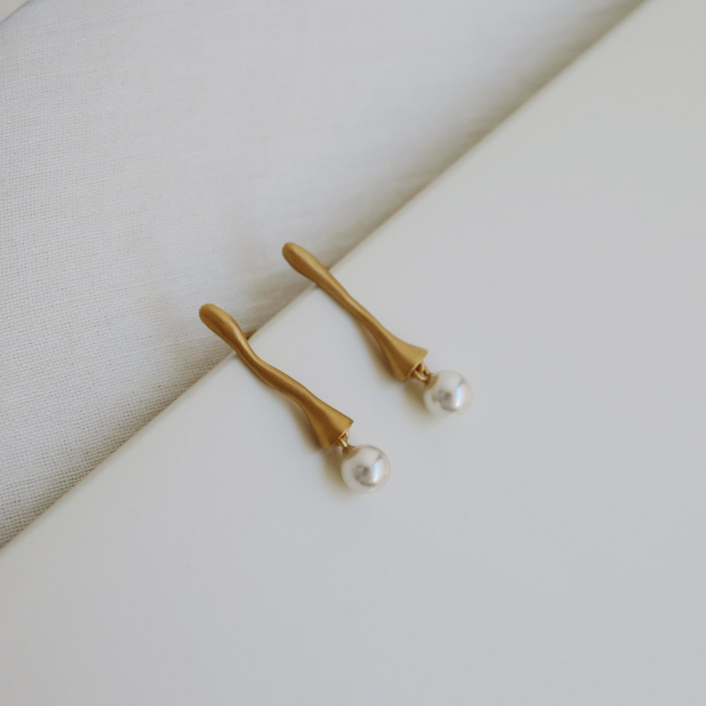 
                  
                    ECLAT Brass Earring
                  
                