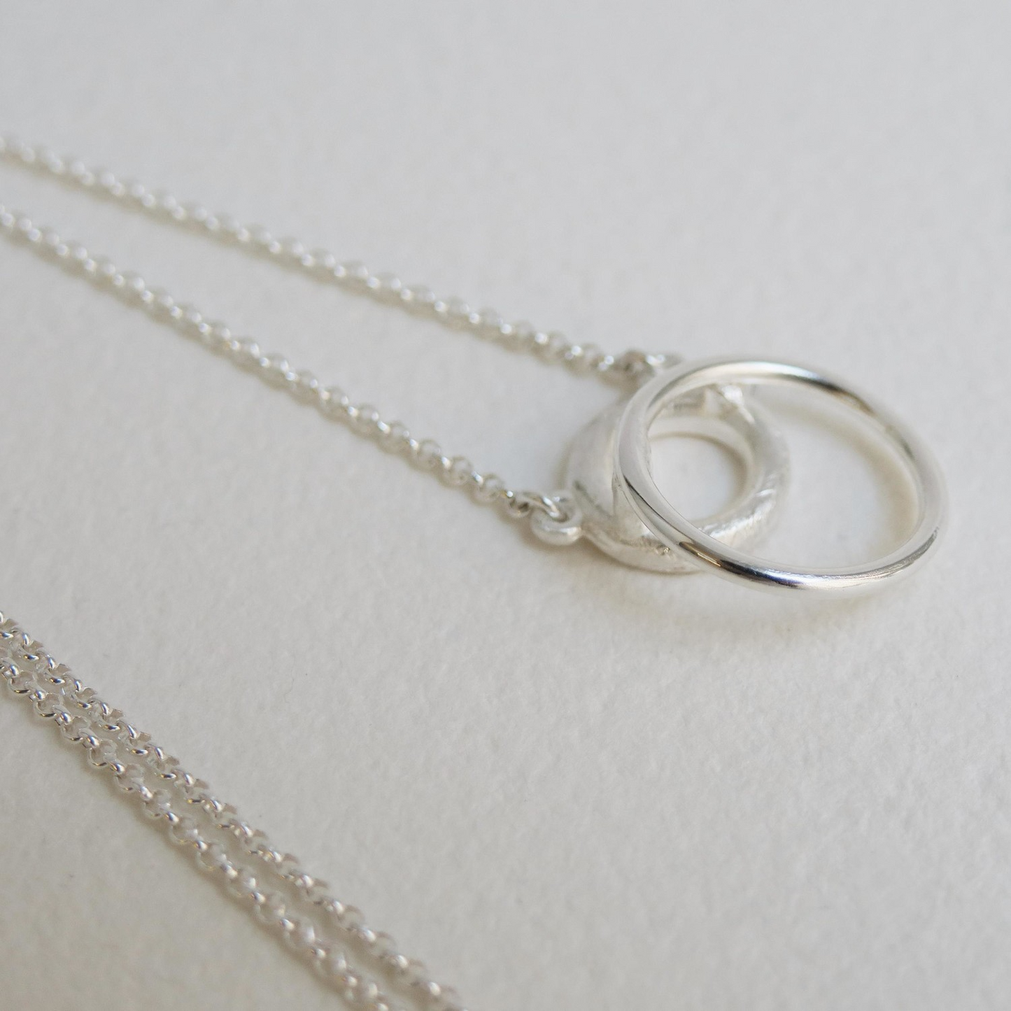 
                  
                    RALL Silver Necklace
                  
                
