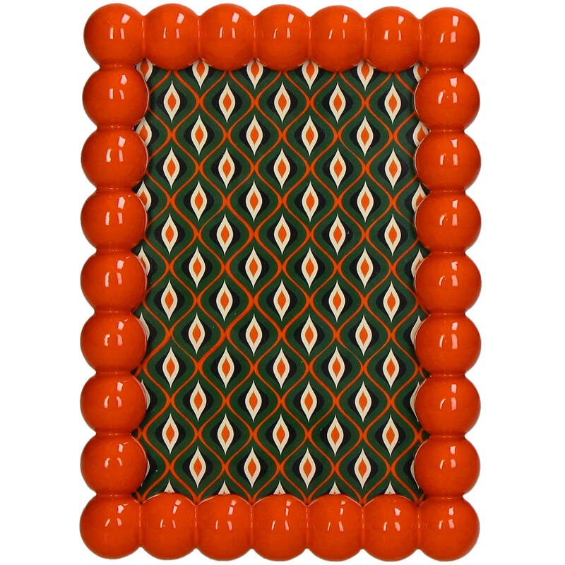 Bilderrahmen mit orangefarbenen Perlen